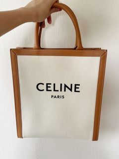 Shop CELINE small drawstring cabas marin in TEXTILE AND CALFSKIN