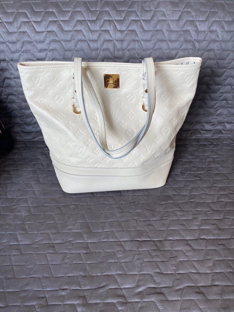 Louis Vuitton Cream empreinte leather tote, Luxury, Bags & Wallets