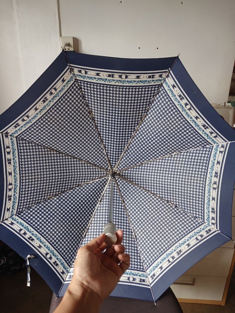 Quality folding umbrella from Japan (Category: Other Accessories) located in Pasig City. Submitted by cie21 (Listing ID 1239379950, Image 2). Description: Folding umbrella, lightweight, unique design (houndstooth blue), lightly used and stocked condition but sturdy and of good quality stainless shaft and 8 gusok, no sleeves. #price depends on condition, quality, rareness and uniqueness of design, and quality and durability. Last price..