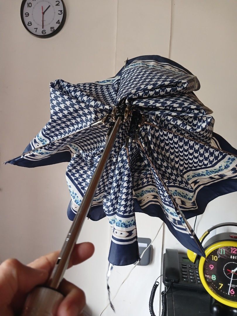 Quality folding umbrella from Japan (Category: Other Accessories) located in Pasig City. Submitted by cie21 (Listing ID 1239379950, Image 3). Description: Folding umbrella, lightweight, unique design (houndstooth blue), lightly used and stocked condition but sturdy and of good quality stainless shaft and 8 gusok, no sleeves. #price depends on condition, quality, rareness and uniqueness of design, and quality and durability. Last price..