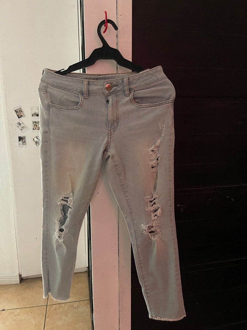 Skinny low rise ripped jeans on Carousell