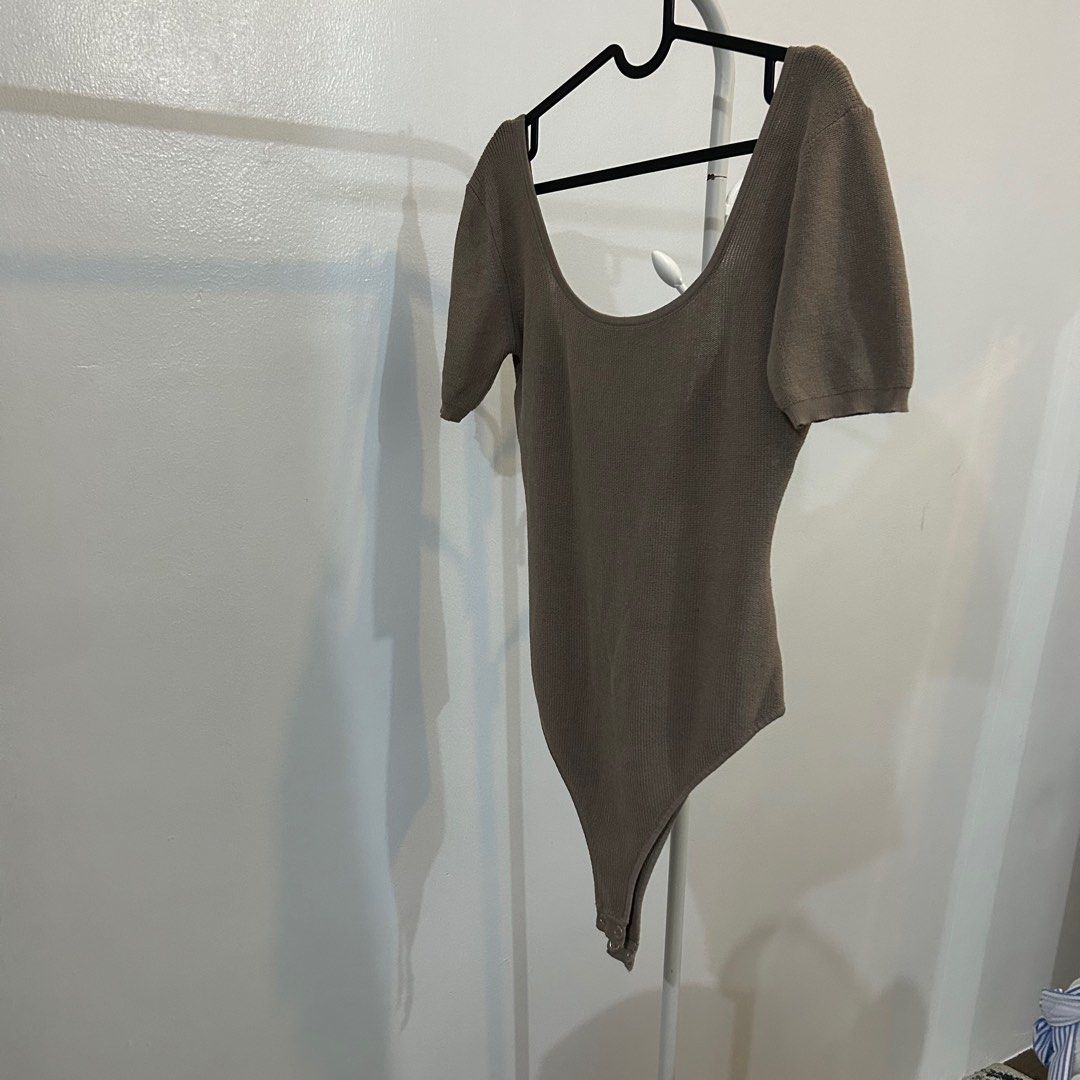 SM Woman Low back knitted bodysuit (Category: Others Tops) located in Calamba. Submitted by fromynes (Listing ID 1239413069, Image 2). Description: Size S Used once Shopee checkout available.