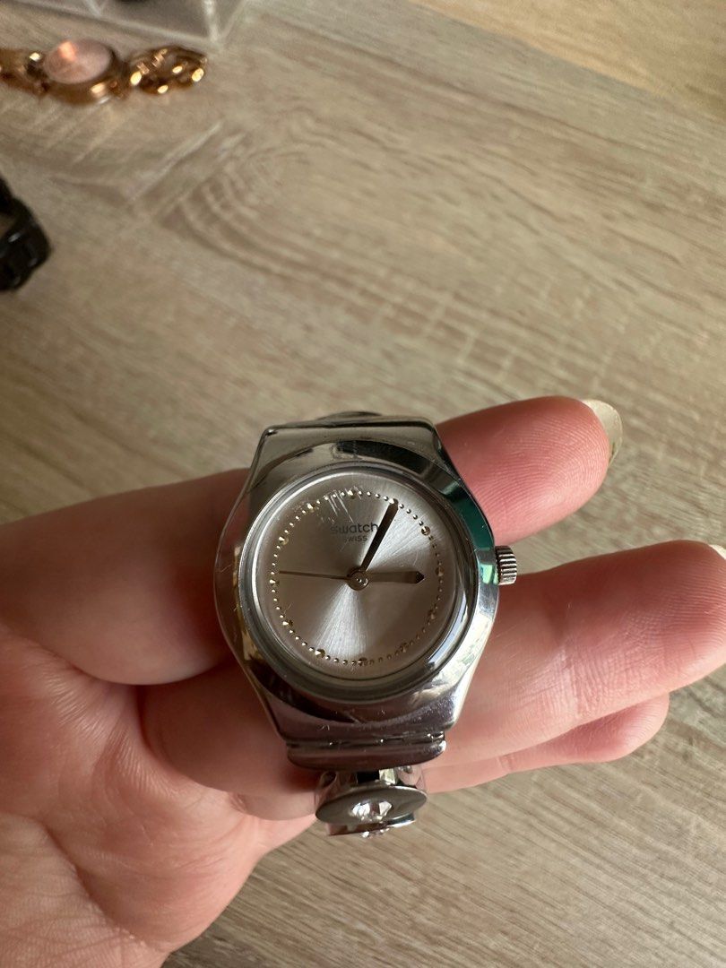 Stainless steel swatch watch top