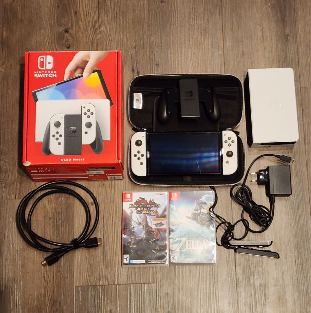 Nintendo Switch oled +2games accessories