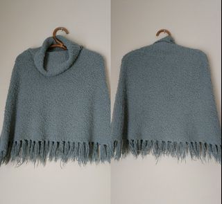 Betty B | A Classic Vintage Roll Neck Poncho Embellished with Tassels.