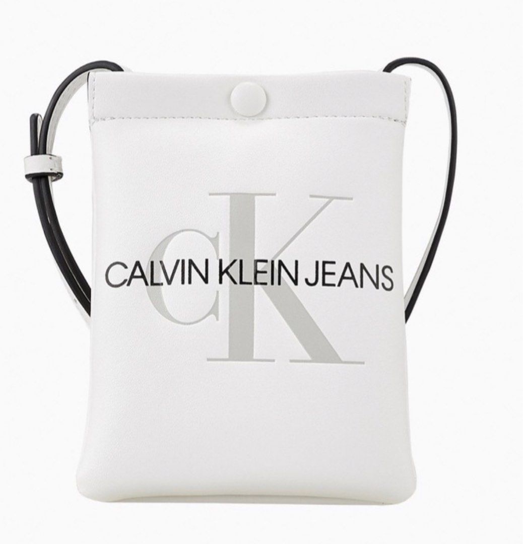 Calvin Klein White Cross-Body Bag, Women's Fashion, Bags & Wallets, Cross-body  Bags on Carousell