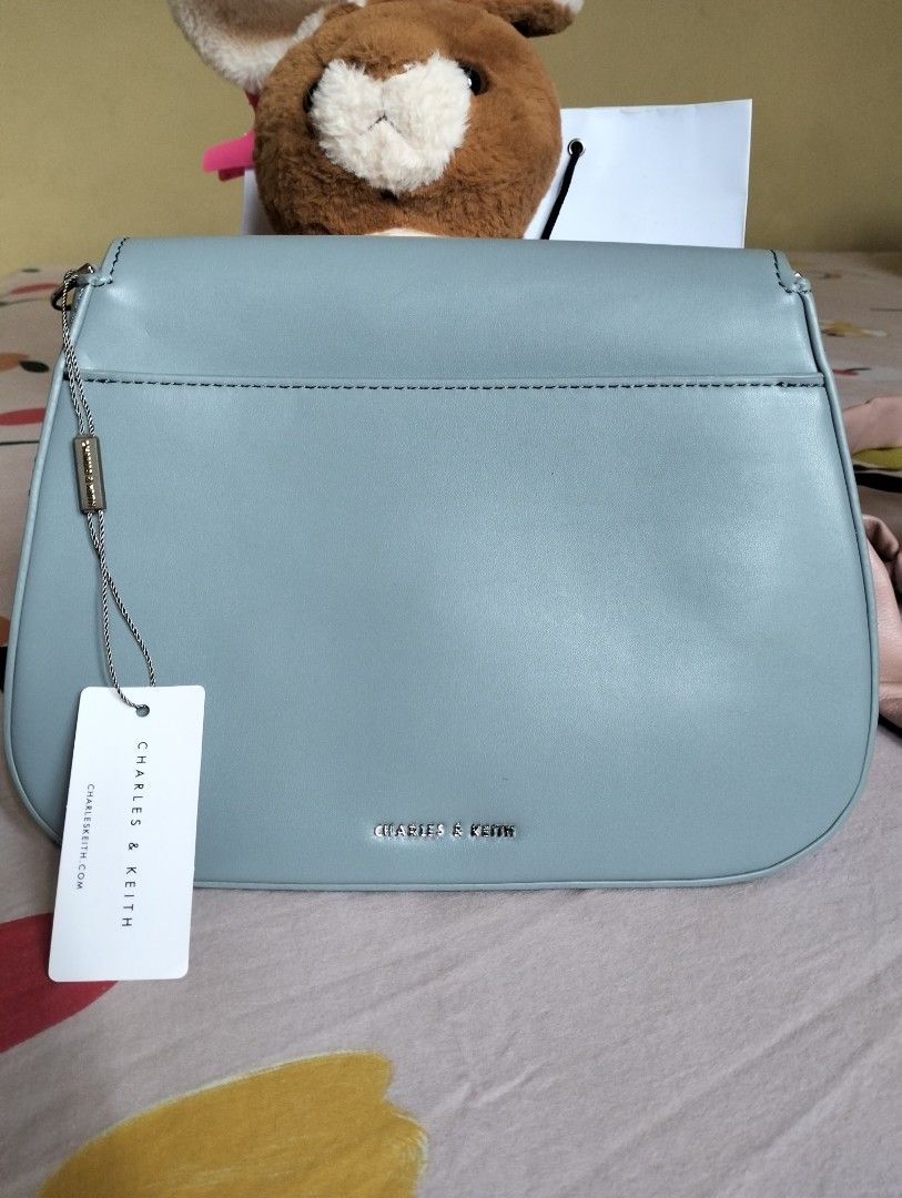 Charles and Keith sling bag on Carousell