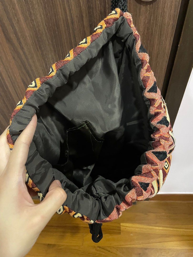 Drawstring Bag (Category: Backpacks) located in Singapore. Submitted by wonsfoelipa (Listing ID 1239699634, Image 2). Description: From Thailand! Brand new, very roomy drawstring bag! Fits many items! Has a pocket at the front.