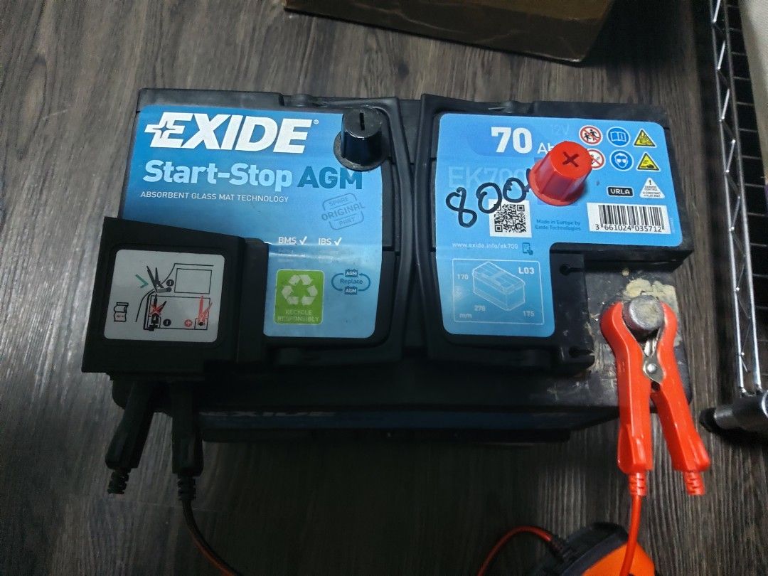 Exide EK700 70ah car battery, holds charge, with battery charger