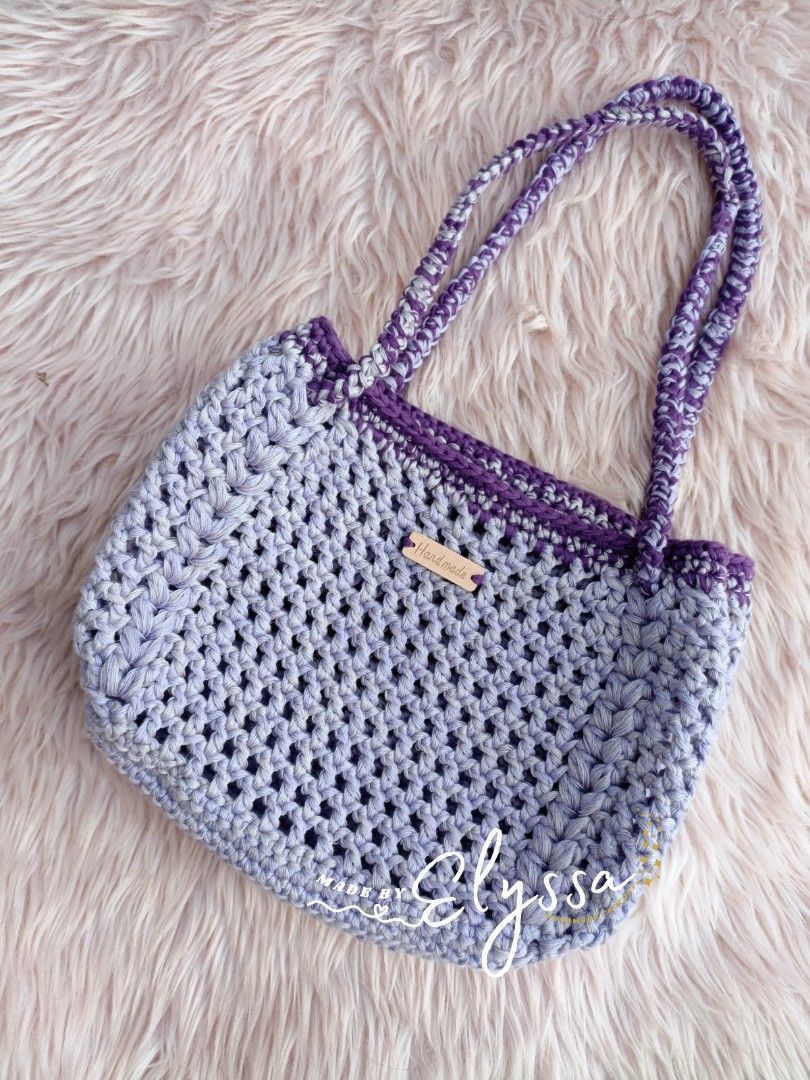 Handmade 2-way Crochet Net Bag (Category: Shoulder Bags) located in Caloocan City. Submitted by _madebyelyssa (Listing ID 1239623439, Image 2). Description: Trendy 2-way Crochet Net Bag 👜 Price starts at ₱399.00, (depends on yarn used) Purple is available to purchase 🫰🏻 message us for made-to-order Location: North Caloocan.