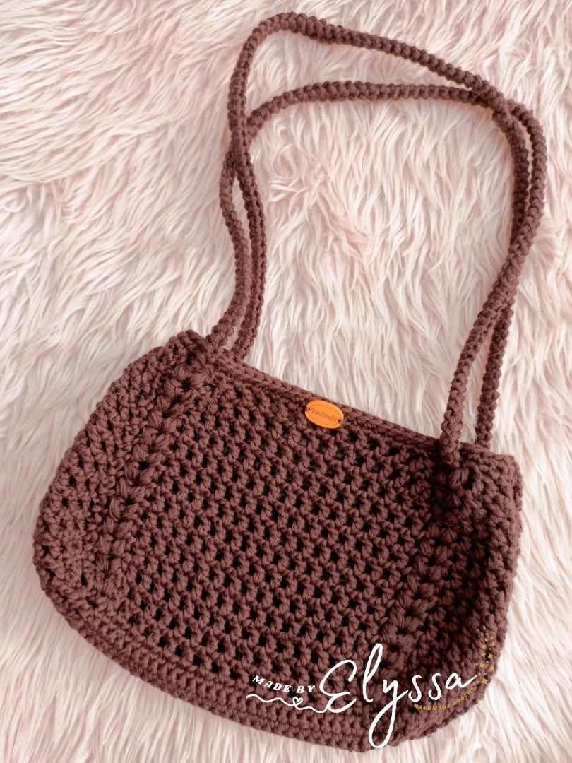 Handmade 2-way Crochet Net Bag (Category: Shoulder Bags) located in Caloocan City. Submitted by _madebyelyssa (Listing ID 1239623439, Image 3). Description: Trendy 2-way Crochet Net Bag 👜 Price starts at ₱399.00, (depends on yarn used) Purple is available to purchase 🫰🏻 message us for made-to-order Location: North Caloocan.