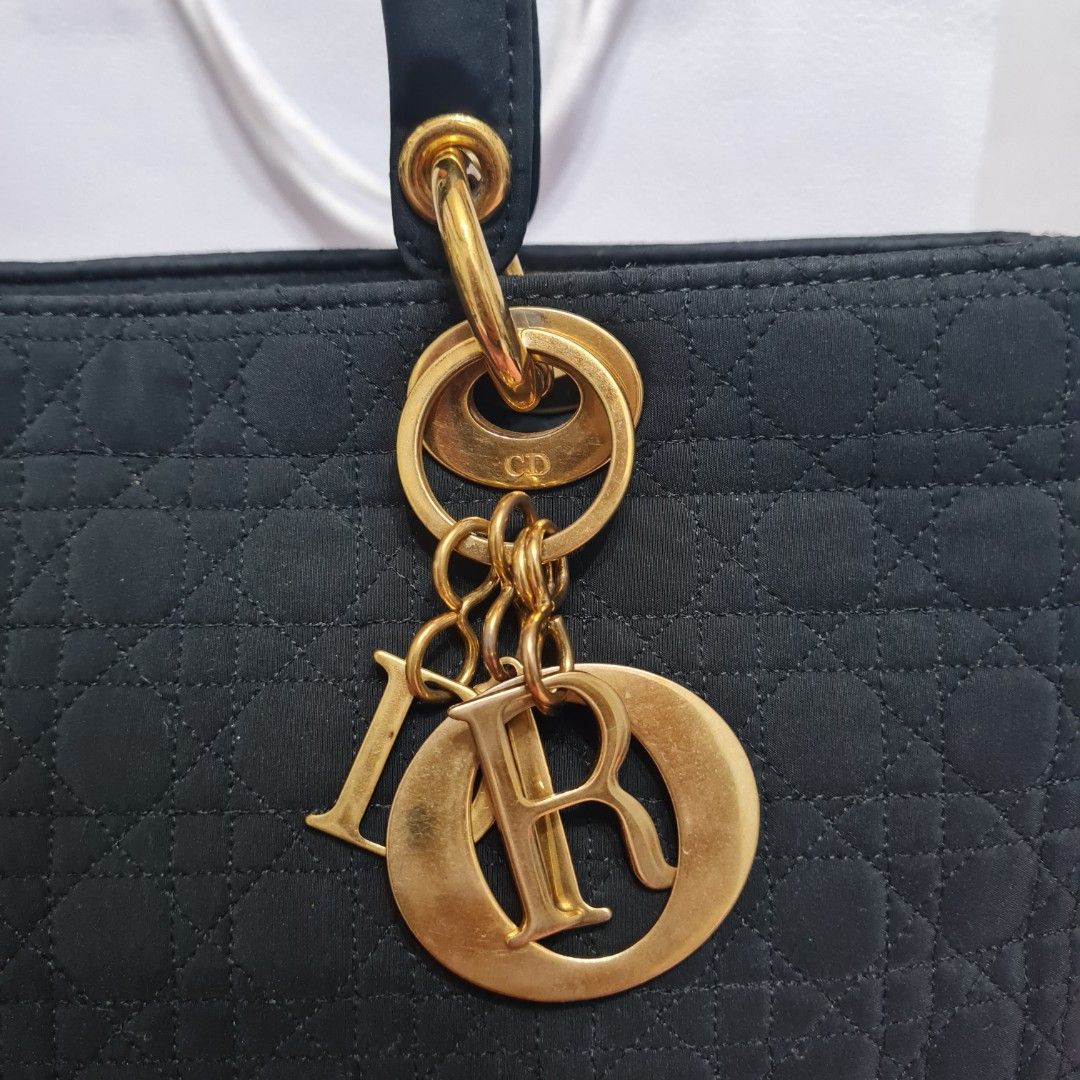 Lady Dior Vintage Cannage Large (Category: Luxury Bags & Wallets) located in Santo Tomas. Submitted by averycassi01874 (Listing ID 1239644352, Image 2). Description: slight stickiness and tarnish on hardwares.