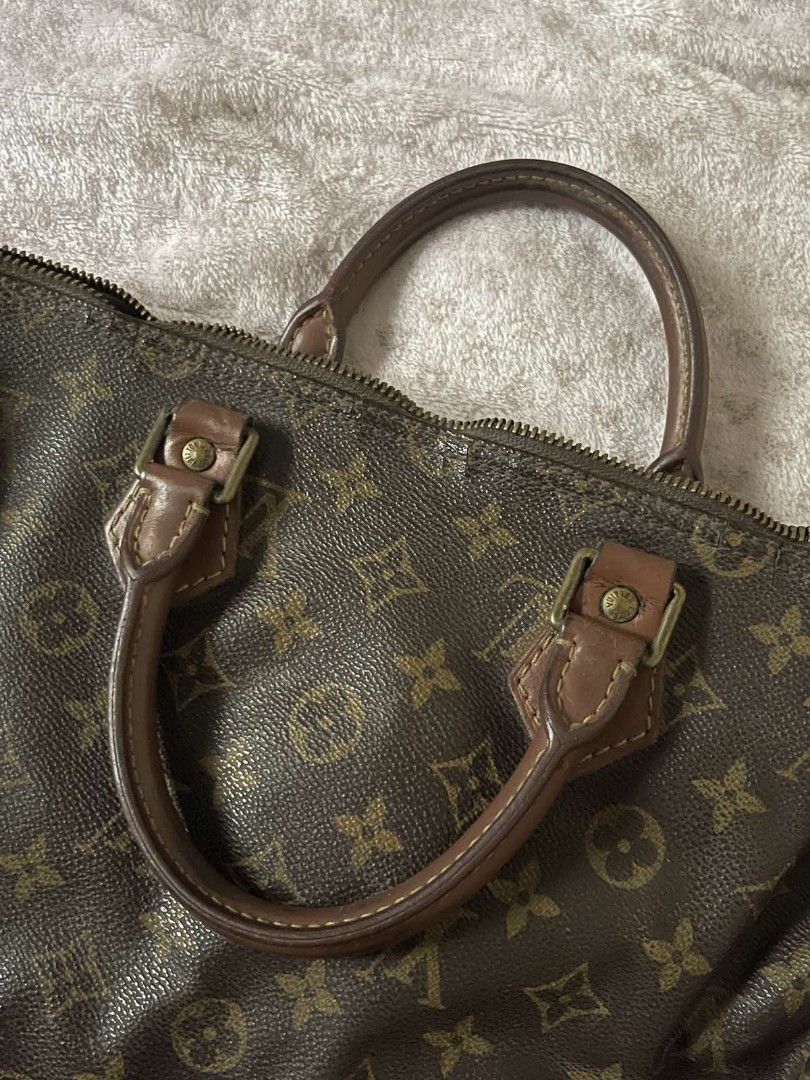 Louis Vuitton Brown Monogram Speedy 35 Top Handle Bag (Category: Luxury Bags & Wallets) located in San Juan City. Submitted by ja-nice (Listing ID 1239591123, Image 2). Description: Louis Vuitton Brown Monogram Speedy 35 Top Handle Bag. Decluttering bag collection, no time to clean or fix minor flaws. What you see is what you get. Message me for other details you need..