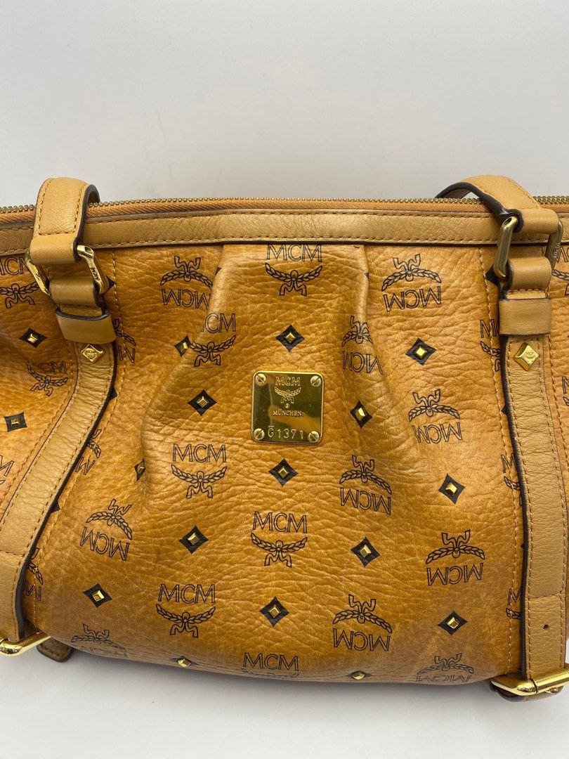 MCM big messenger bag, Luxury, Bags & Wallets on Carousell