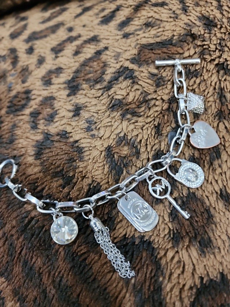 Michael kors charm bracelet hotsell