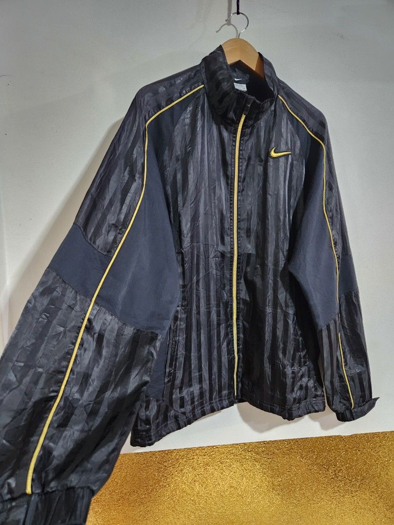 Black and gold nike track jacket on sale