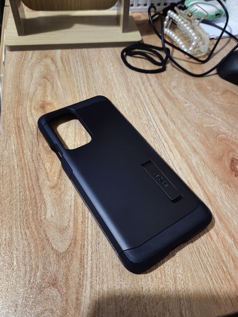 One plus 9 pro Spigen orig case (Category: Cases & Sleeves) located in Manila. Submitted by jojob1105 (Listing ID 1239640221, Image 2). Description: Original Spigen tough armor case used a couple of times only, opted for another case instead. Item is in like new condition but no more box..