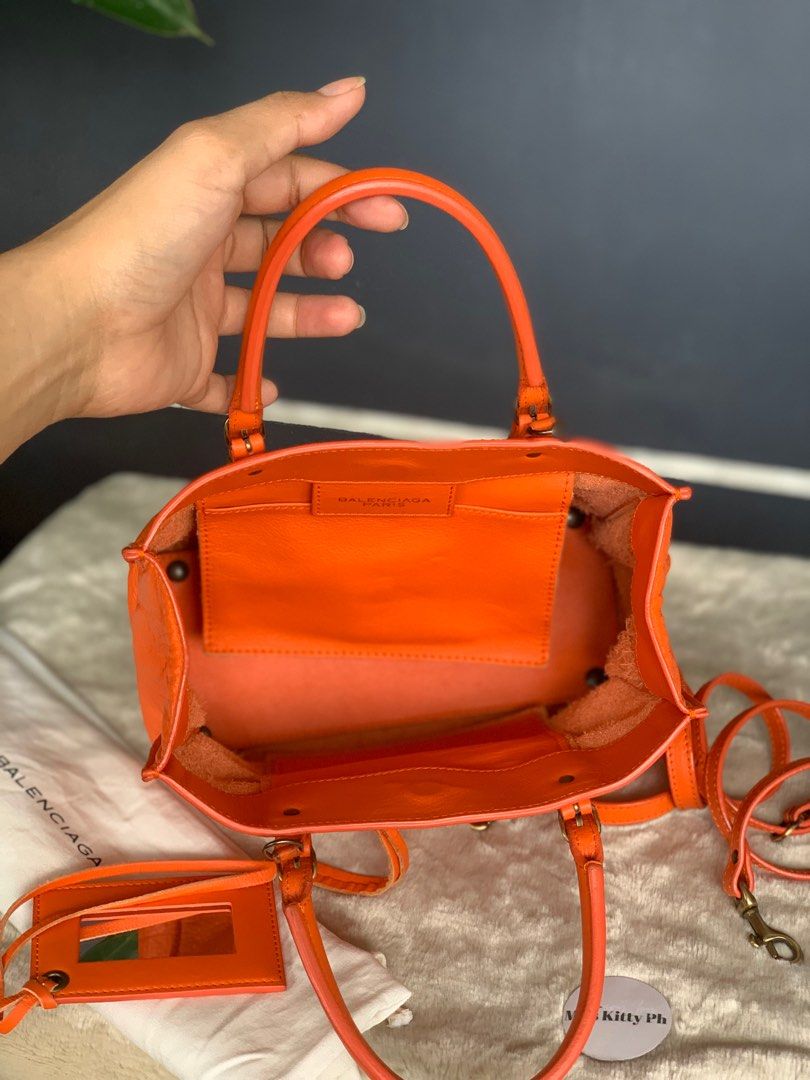 Le Cagole XS Leather Shoulder Bag in Orange - Balenciaga | Mytheresa