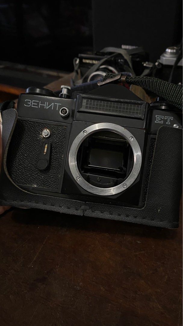 Zenit ET 35mm Film Camera (Category: Cameras) located in Tabaco. Submitted by cinemahilig (Listing ID 1239709564, Image 1). Description: All speeds ok. Self timer ok. With half case and strap. Item location: Tabaco City, Albay. 09395763334.