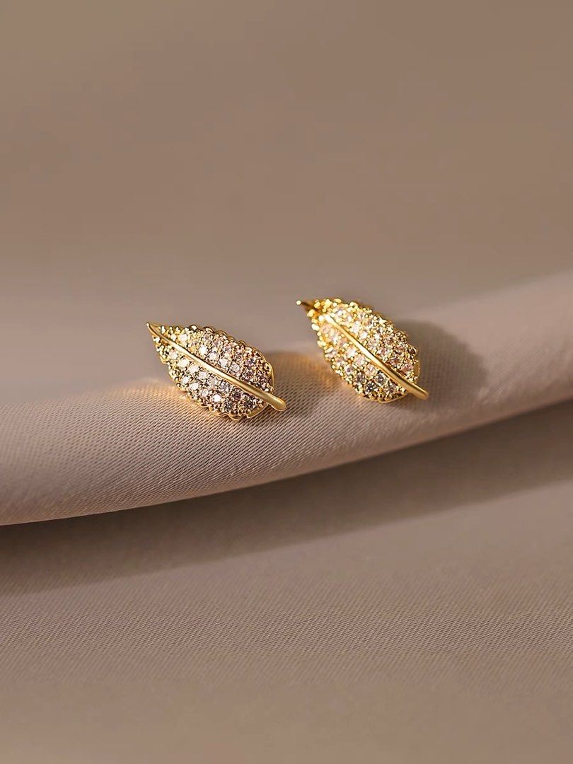 Gold stud earrings leaf design sales