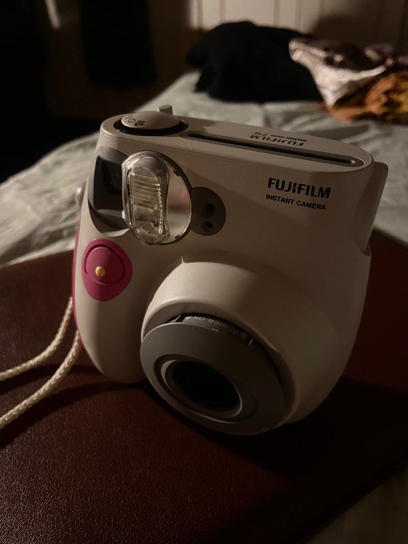 Instax Mini 7s (Category: Cameras) located in San Fernando. Submitted by pamariapineda (Listing ID 1239718753, Image 3). Description: Selling my pre-loved Instax Mini 7s Rarely used with free bag and battery 😊.