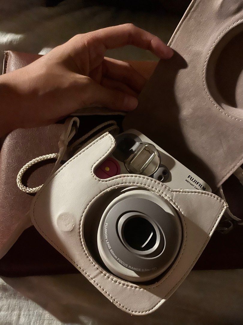 Instax Mini 7s (Category: Cameras) located in San Fernando. Submitted by pamariapineda (Listing ID 1239718753, Image 2). Description: Selling my pre-loved Instax Mini 7s Rarely used with free bag and battery 😊.