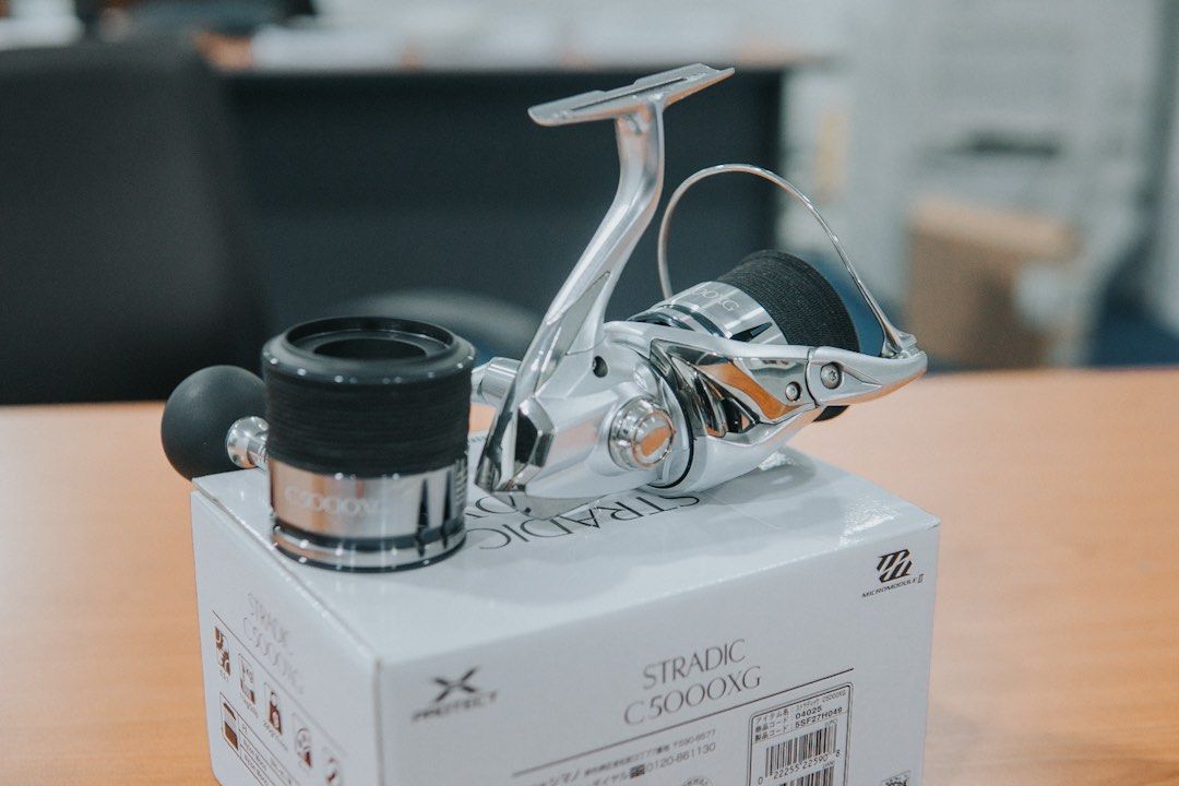 Stradic FL 5000XG with Extra Spool, Sports Equipment, Fishing on Carousell