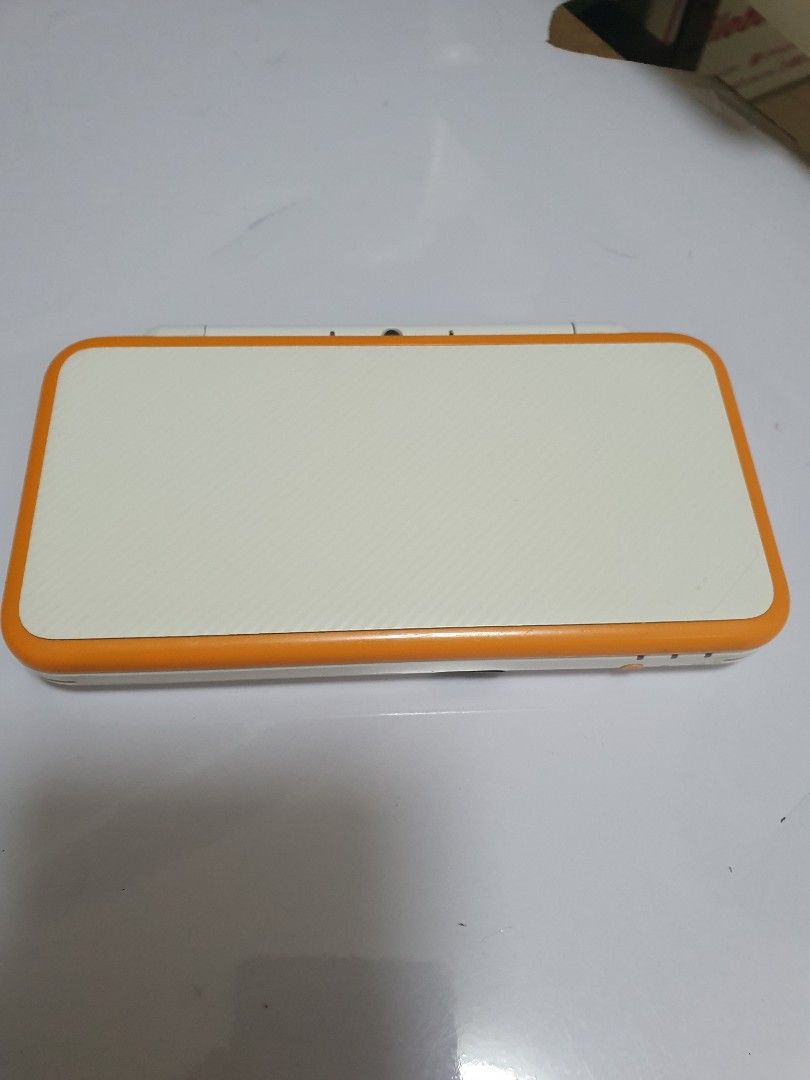 White Orange New Nintendo 2DS XL (Category: Nintendo) located in Quezon City. Submitted by itemsforadoption (Listing ID 1239845897, Image 1). Description: Rfs: Its 2023! Happy New Year! Hoping you have a good year ahead of you! If you have questions feel free to send a message. Though I'll most likely be able to reply from 10am to 8pm. Please be patient and understanding. Decluttering games and items that I've picked up or for friends and family.
