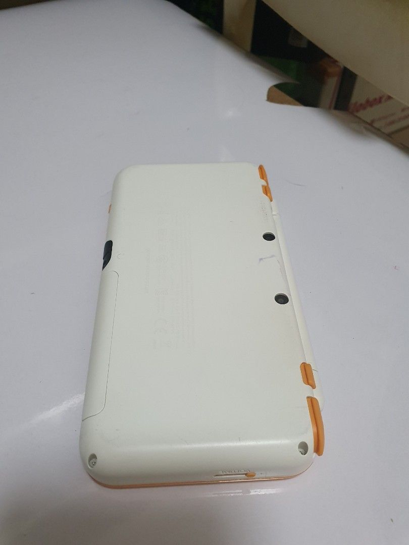 White Orange New Nintendo 2DS XL (Category: Nintendo) located in Quezon City. Submitted by itemsforadoption (Listing ID 1239845897, Image 3). Description: Rfs: Its 2023! Happy New Year! Hoping you have a good year ahead of you! If you have questions feel free to send a message. Though I'll most likely be able to reply from 10am to 8pm. Please be patient and understanding. Decluttering games and items that I've picked up or for friends and family.