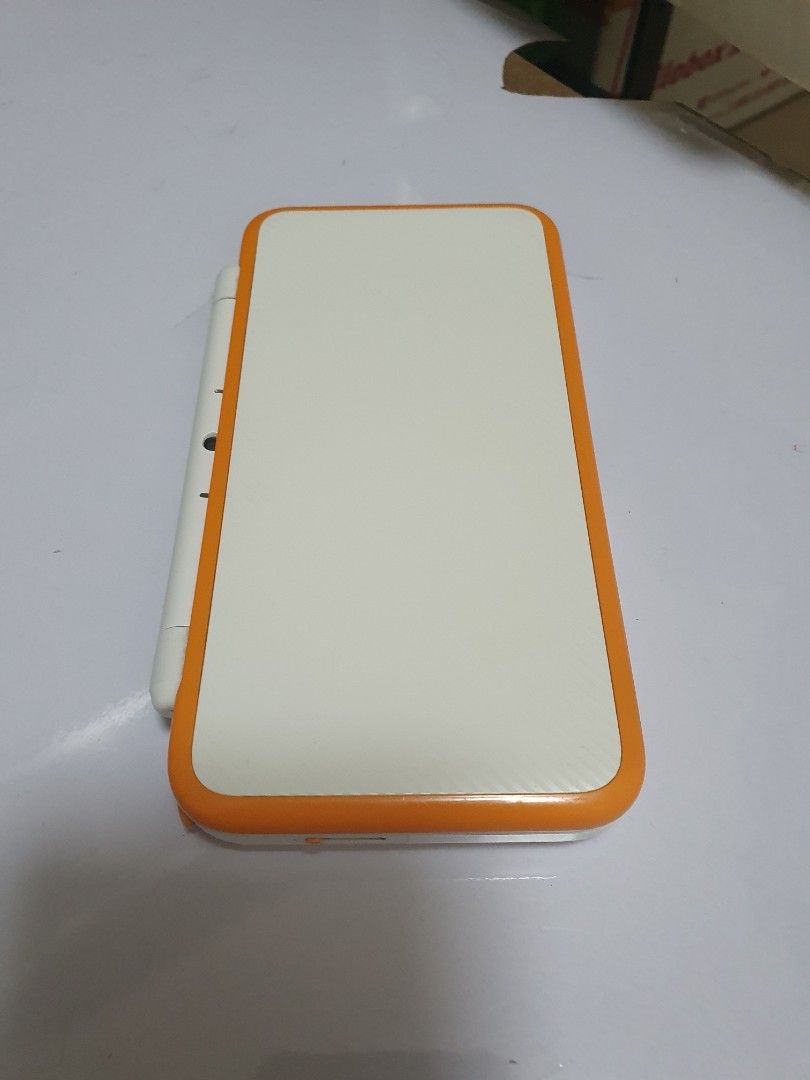 White Orange New Nintendo 2DS XL (Category: Nintendo) located in Quezon City. Submitted by itemsforadoption (Listing ID 1239845897, Image 2). Description: Rfs: Its 2023! Happy New Year! Hoping you have a good year ahead of you! If you have questions feel free to send a message. Though I'll most likely be able to reply from 10am to 8pm. Please be patient and understanding. Decluttering games and items that I've picked up or for friends and family.