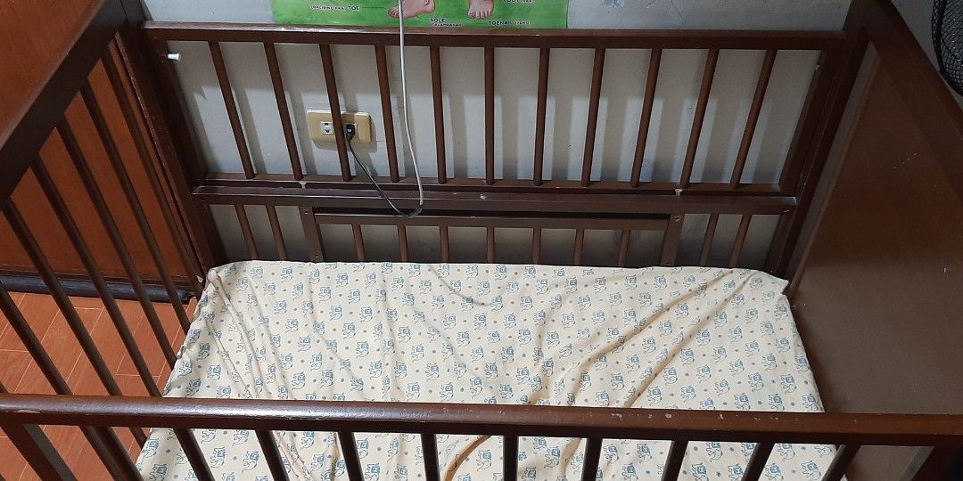 Wooden baby crib on Carousell