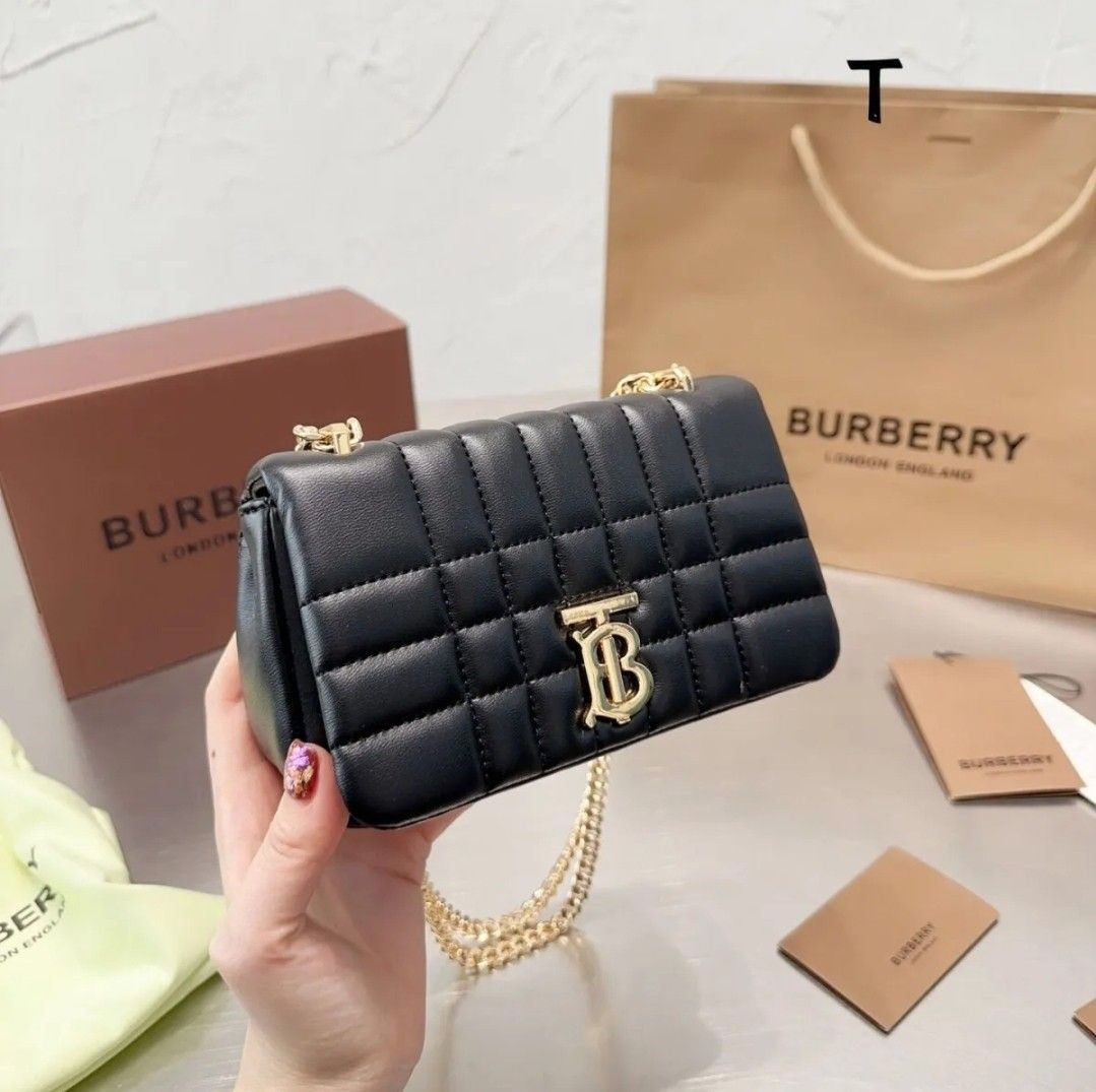 Burberry Sling Bag (Category: Luxury Bags & Wallets) located in Caloocan City. Submitted by thrisciatan.1 (Listing ID 1239954173, Image 2). Description: Burberry Sling Bag Size: length 18 * width 7 * height 10 (cm) Weight: 0.55kg Packaging: w/ box Material: cowhide. High purity hardware (non fading) Packaging list: 1 x gift box. 1 x bag, dustproof cloth, shopping receipt.