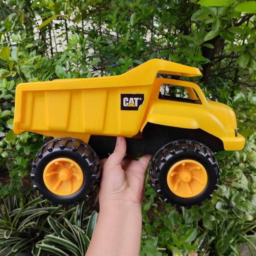Cat tough tracks the feel outlet of real dump truck by caterpillar