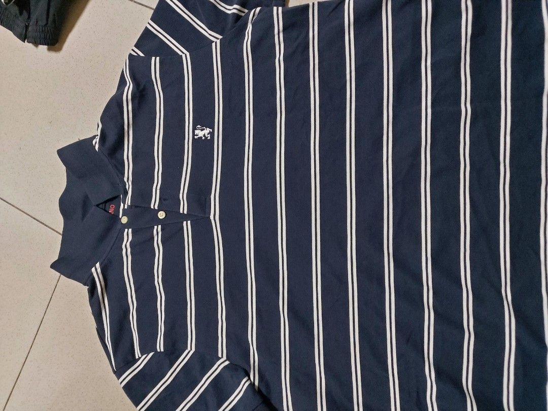 Giordano Poloshirt (Category: Tshirts & Polo Shirts ) located in Pasig City. Submitted by borjong (Listing ID 1239958323, Image 2). Description: Giordano Polo Shirt Like New used only once Color: Navy Blue/White Striped Size : XXL TAPPERED Fit RFS: Too Small.