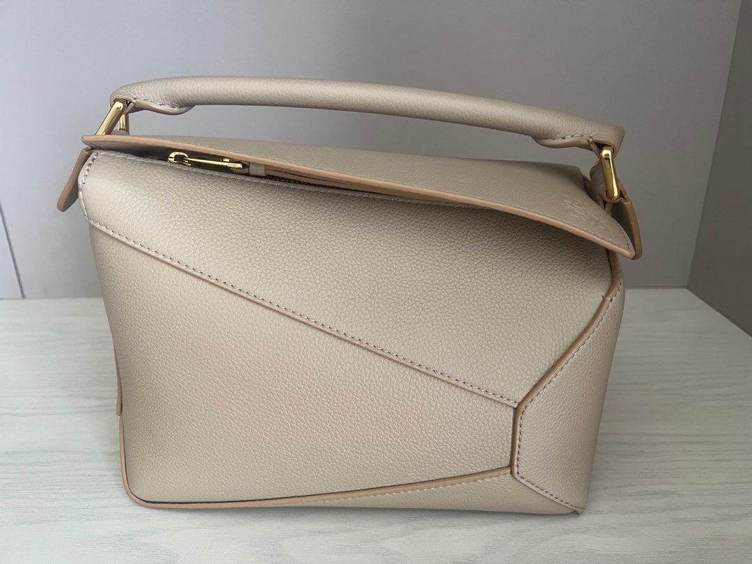 Small puzzle bag store in soft grained calfskin