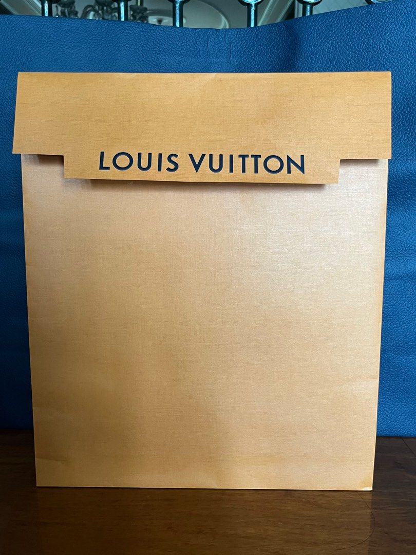 LOUIS VUITTON ENVELOP STYLE PAPER BAG (Category: Luxury Bags & Wallets) located in Makati City. Submitted by cashfrancefashioncosmetics_ph (Listing ID 1239906510, Image 2). Description: LOUIS VUITTON ENVELOP STYLE PAPER BAG ORIGINAL FROM LV SHOPS 17 INCHES HEIGHT 15 INCHES LENGHT 3INCHES WIDTH .