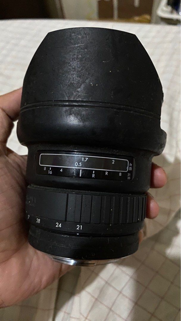 Sigma Zoom 21mm to 35mm. A Mount. (Category: Lens & Kits) located in Tabaco. Submitted by cinemahilig (Listing ID 1239933676, Image 3). Description: Malinis un lente. Malagkit lang ung rubber sa barrel. Good working condition. Selling as-is. Last price posted. Buyer shoulders shipping. Item location: Tabaco City, Albay. 09395763344.