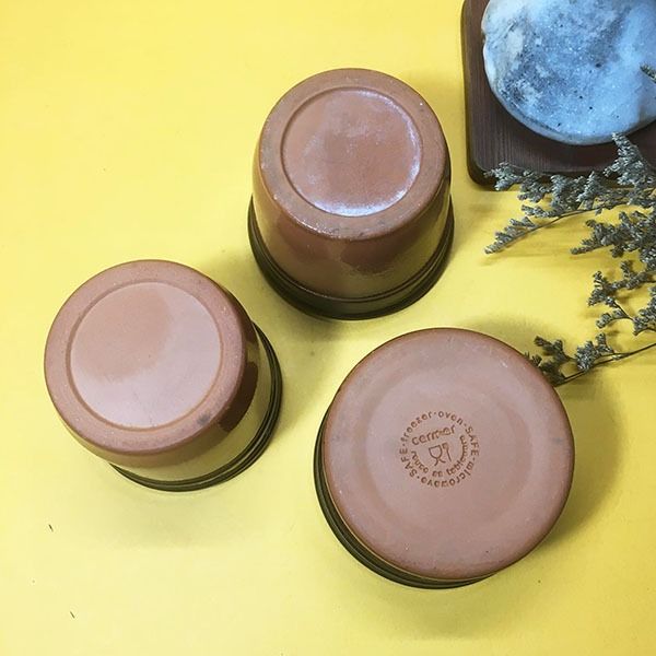 Two-toned brown ramekin and pudding cups (set) (Category: Bakeware) located in Mandaluyong City. Submitted by yula_noveltyfinds (Listing ID 1239950430, Image 3). Description: Perfect for a cottage core or rustic themed setting - England surplus - 1 pudding cup with flaw: minor chip on the side (see photo) - 1 pudding cup with flaw: with chip and hairline, can be repurposed as succulennt planter (see photo) - as is where is - size pudding cup A: 3