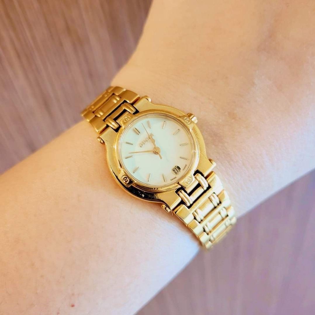 Authentic Gucci 9200L ladies watch Rank A Condition no fade gold na gold Small to med wrist size Provided box