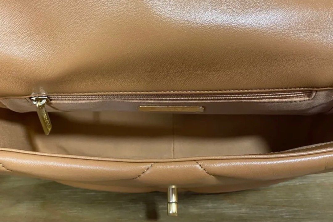 Chanel 19 Brown GHW Lambskin (Category: Luxury Bags & Wallets) located in Quezon City. Submitted by __12345 (Listing ID 1240168230, Image 3). Description: - for preorder - 9.5/10 condition - small, brown GHW, series no HCE - inclusions: dustbag, receipt, box - can do meet ups/delivery - guaranteed authentic or money back - detailed photos available upon request - entrupy available upon request open to other bag requests! just send a pm 💌🛍️.