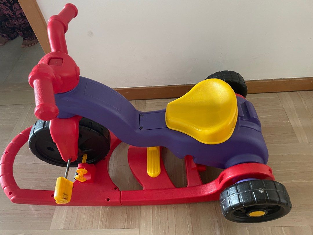 Fisher price rock shop a stack tricycle