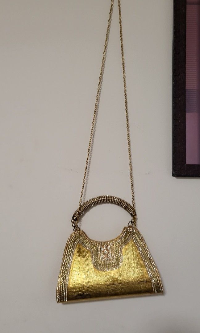 Gold colour clutch store bag