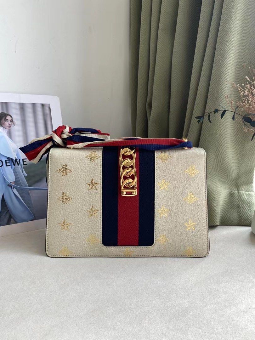 White and sales gold gucci bag