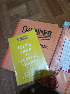 IELTS guide book with orange book