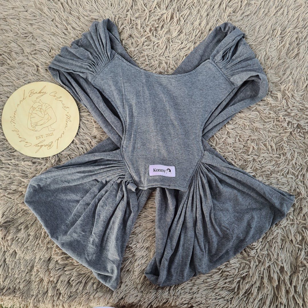 Konny wrap carrier (Category: Carriers & Slings) located in Cabiao. Submitted by MomAndBabyCorner (Listing ID 1240135511, Image 2). Description: Konny XXL No outer sash included still wearable Excellent Used Condition PHP 500.