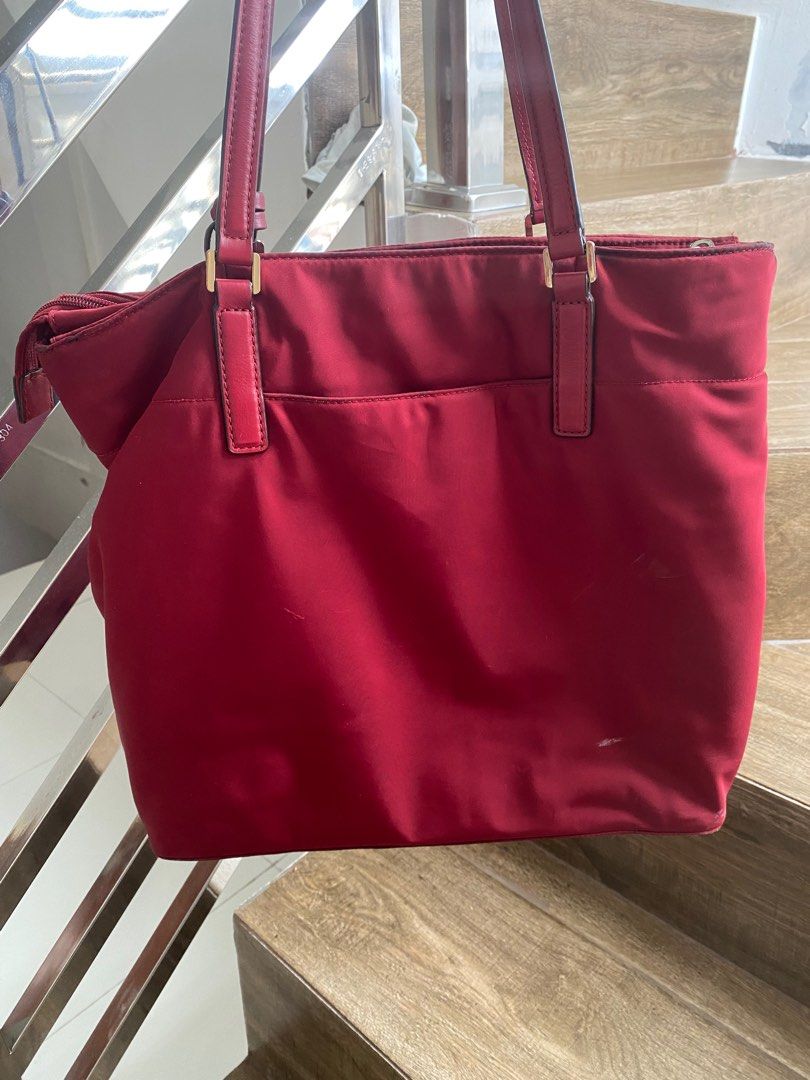 MK tote bag preloved (Category: Luxury Bags & Wallets) located in San Jose del Monte. Submitted by joysamarille (Listing ID 1240112855, Image 2). Description: Pre loved Michael Kors Tote Bag Guaranteed authentic (bought in US) material: nylon color: maroon #prelovedbags #authenticbags .