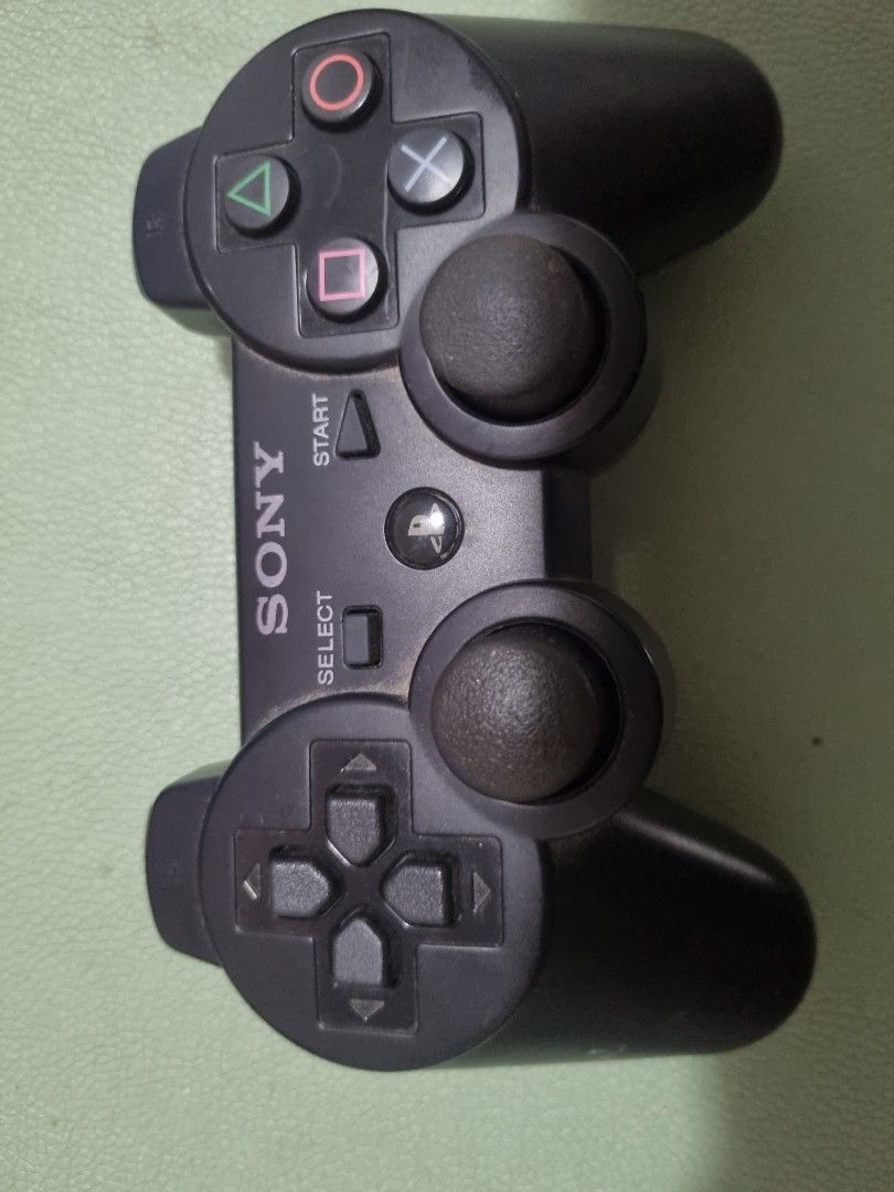 Playstation console controller (Category: PlayStation) located in Singapore. Submitted by cayotelives (Listing ID 1240118446, Image 1). Description: please check if this is what you need I not familiar anything with this thanks :).