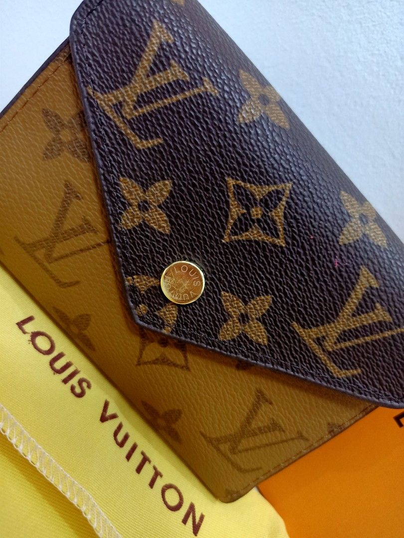 Preloved Lv Tri- Fold Reverse (Category: Luxury Bags & Wallets) located in Cebu City. Submitted by day.98 (Listing ID 1240088032, Image 2). Description: from USA genuine leather meduim size coded & etikita no flaws.