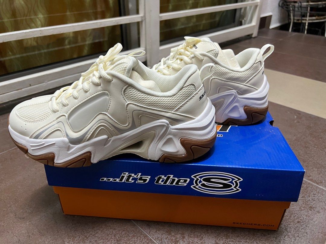 Cream skechers hot sale