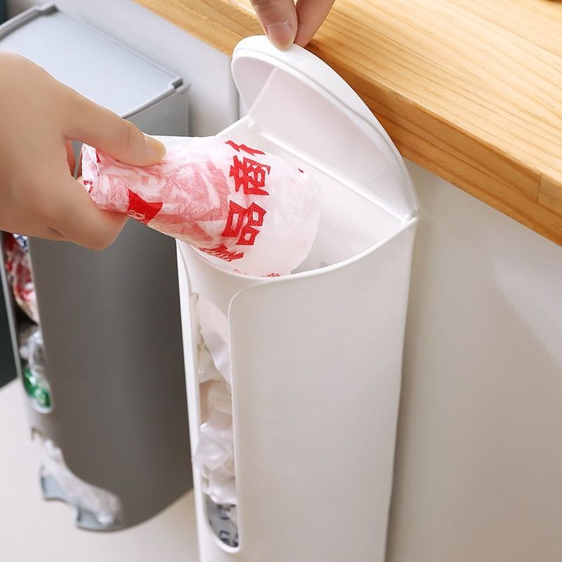 Wall Mounted Trash Bag Storage Garbage Bag Napkin Holder (Category: Home Improvement Tools & Accessories) located in Manila. Submitted by winterbliss (Listing ID 1240109896, Image 2). Description: Material: PVC Size: L:9.5cm W: 9.5cm H:30.5cm Colors: White, Dark green.